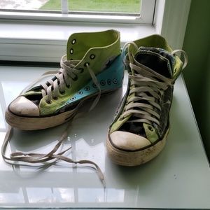 Custom designed one of a kind converse shoes.
